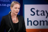 Health Minister Sarah Courtney speaks at a media conference