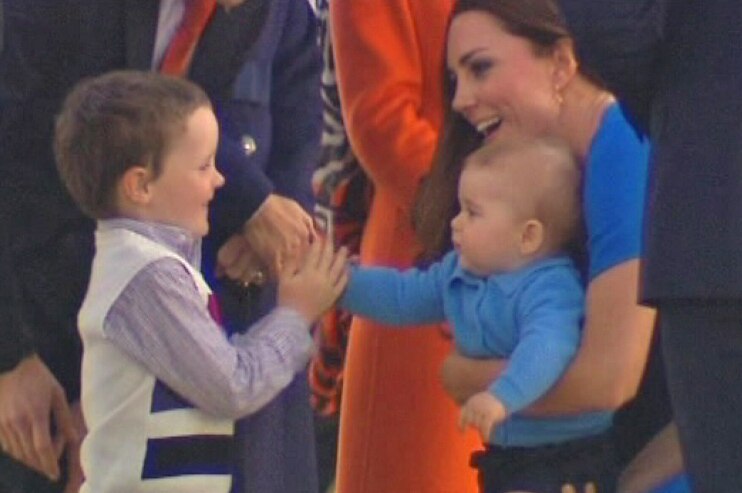 Prince George was delighted to see a young face in the official welcoming party.