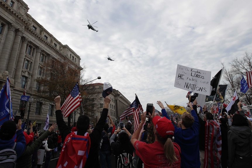 Marine One helicopter flies over Pro-Trump rallies in Washington