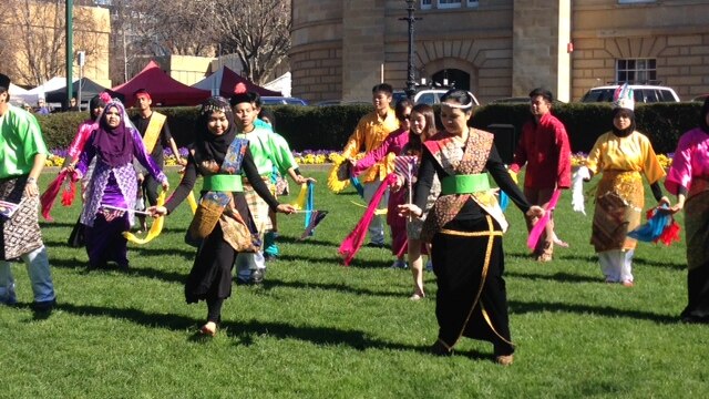 Traditional Malaysian dancers perform on the parliament lawns.