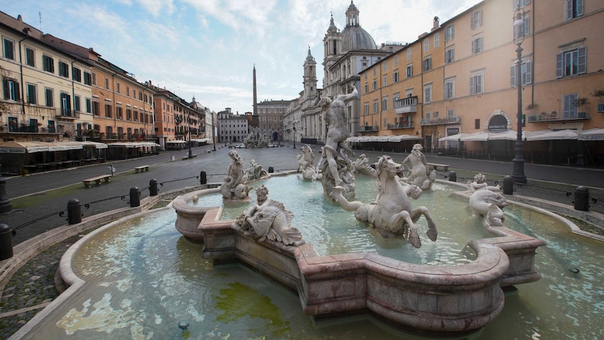 The Piazza Navona stands completely empty with a fountain in the foreground.