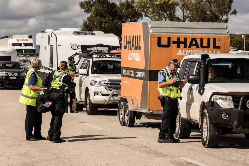 Police at a road block.