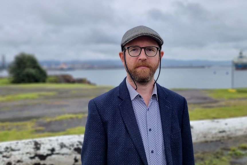 A man wearing a flat cap.