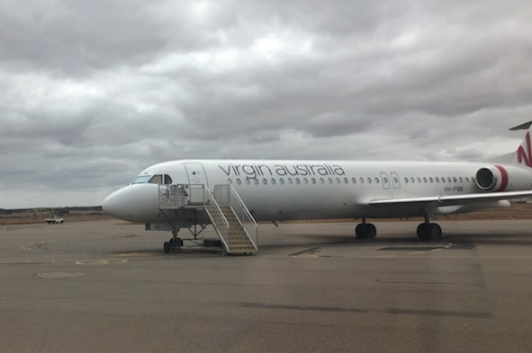 A plane stuck in unset tarmac at Geraldton Airport
