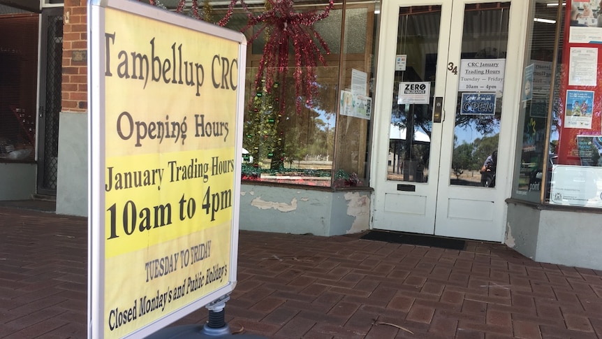 A sign for the Tambellup Community Resource Centre outside a shop in the main street