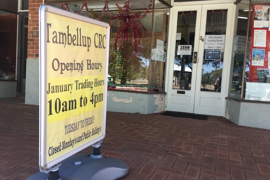 A sign for the Tambellup Community Resource Centre outside a shop in the main street