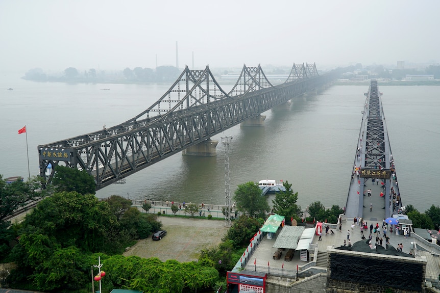 A bridge over a wide river. 