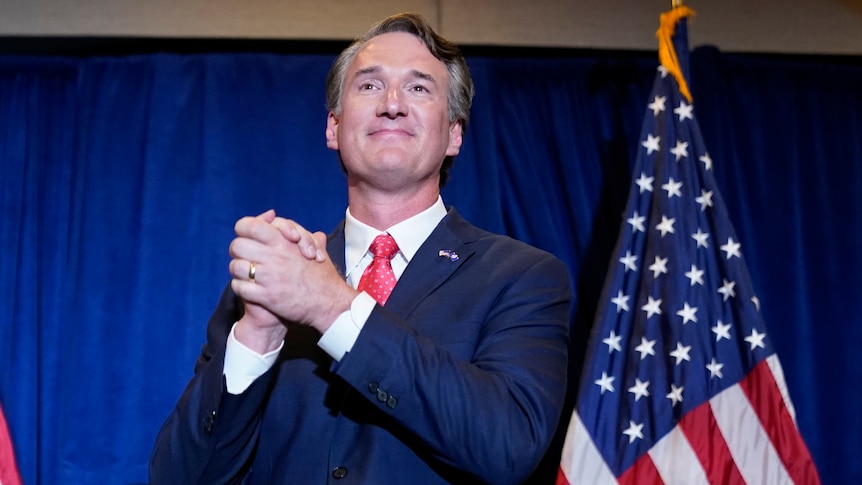 Virginia Gov.-elect Glenn Youngkin arrives to speak at an election night party