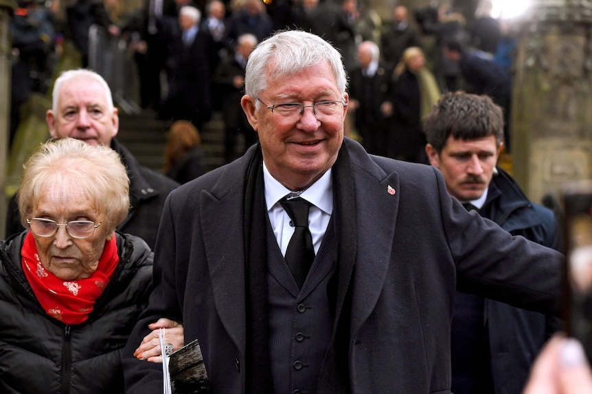 Sir Alex Ferguson leaves Sir Bobby Charlton's funeral