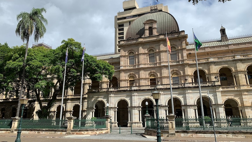 State Parliament in Brisbane, a two storey old stone building.