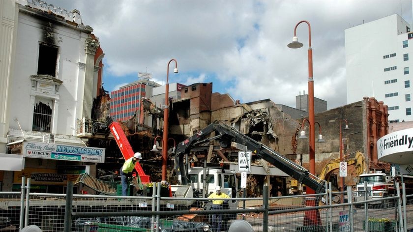 Workers demolish the burnt out Myer building in 2007.