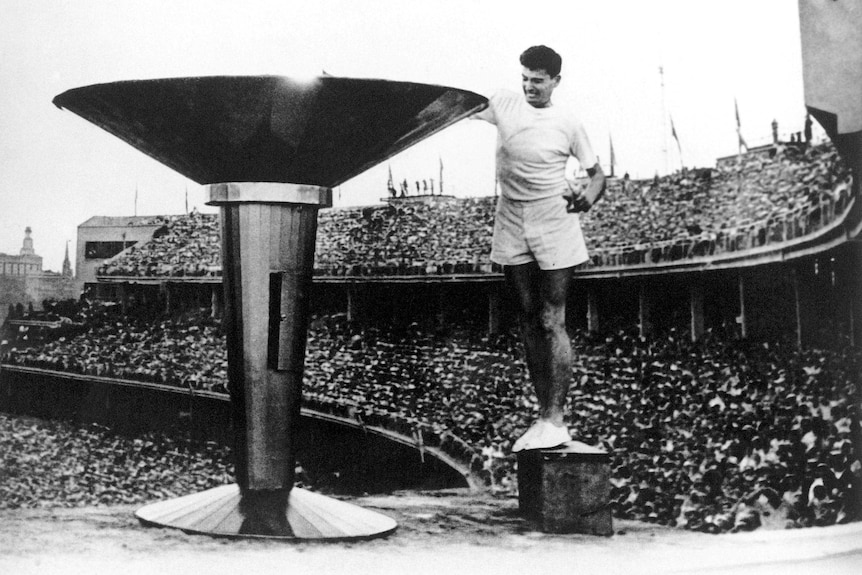 Ron Clarke lights 1956 cauldron