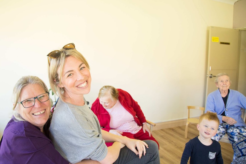 Imlay Kindy coordinator Hayley Reynolds and diversional therapist Sheridan Leftwich have a laugh in the day care room