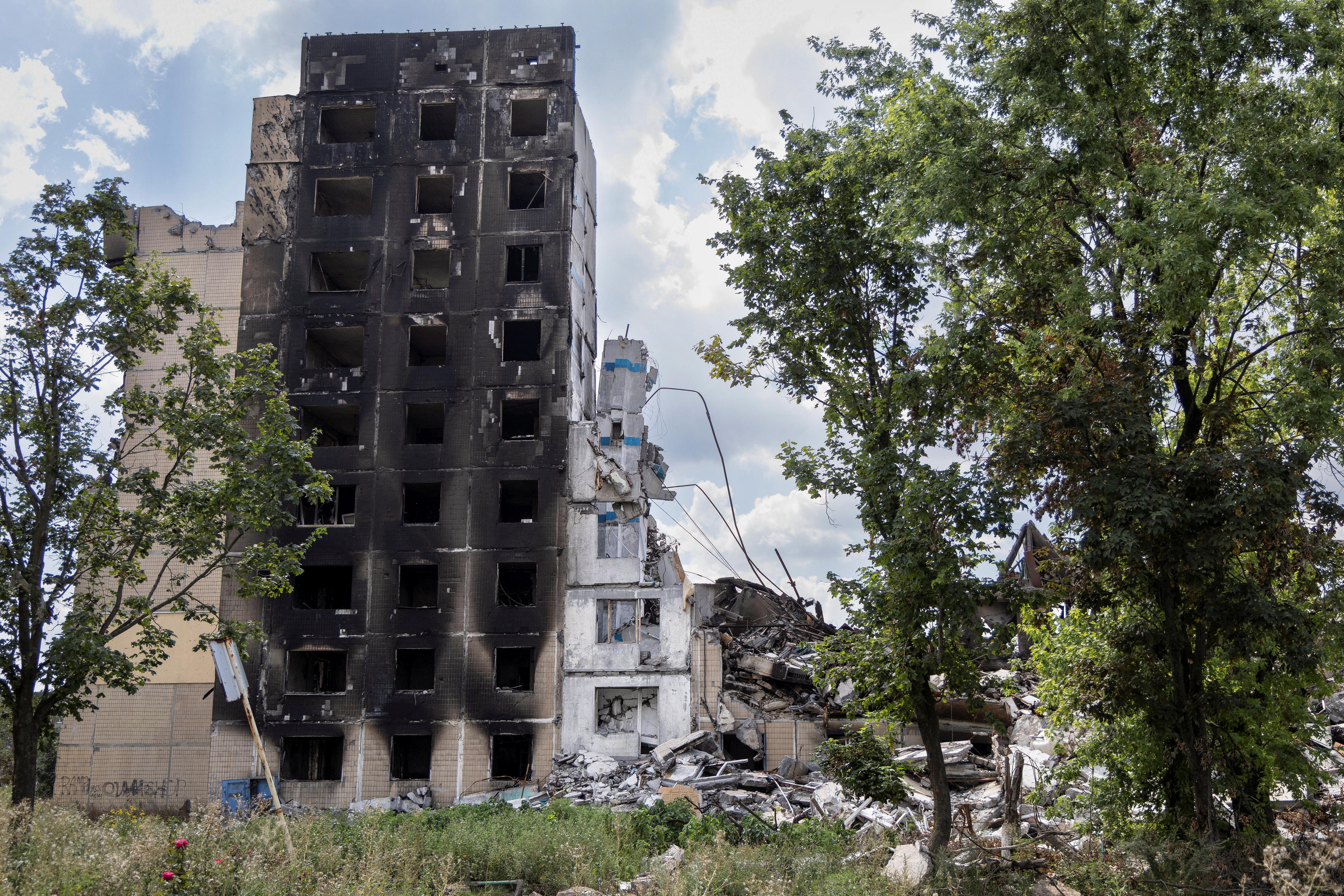 Building is half torn down.