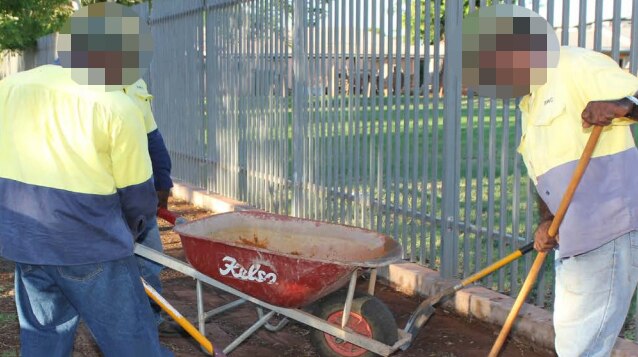 A photo of prisoners at work in the NT community.
