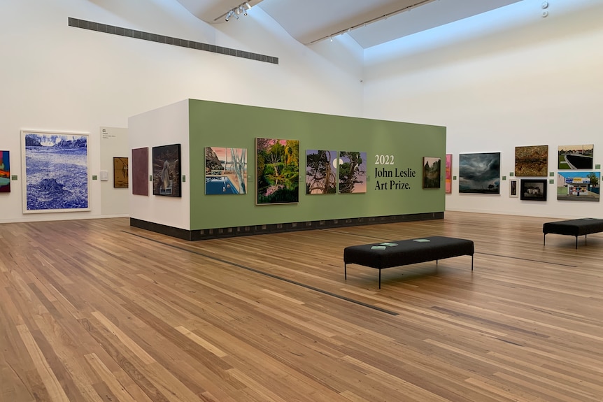 Wide view of the Gallery space with pictures on the walls
