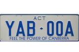 An ACT number plate with the caption "feel the power of Canberra."
