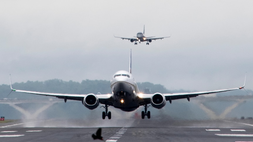 A flight lands on a runway