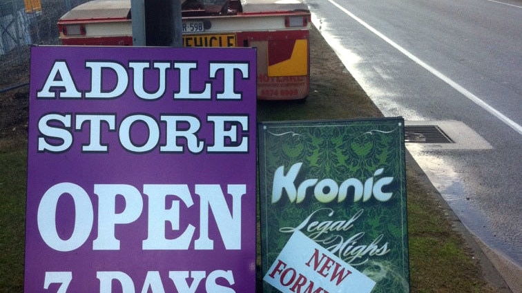 A sign advertising a new version of Kronic for sale in a Perth suburb