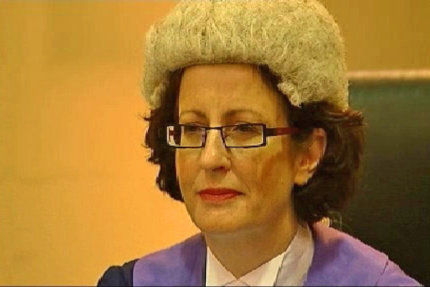 A female judge wearing a wig