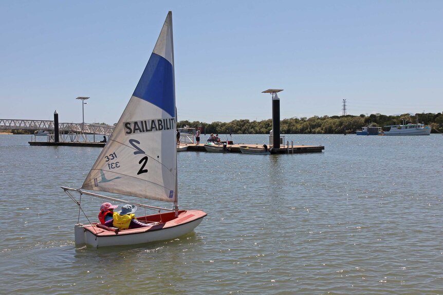 Sailability yacht out on Ross Creek in South Townsville.