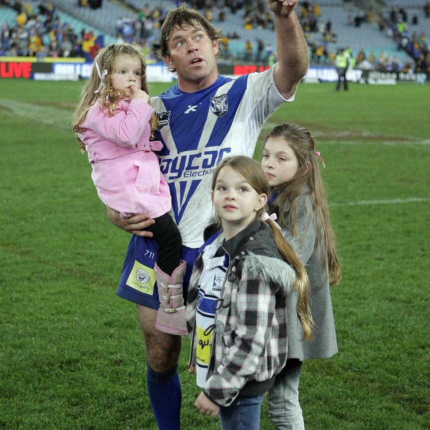 Brett Kimmorley and his daughters