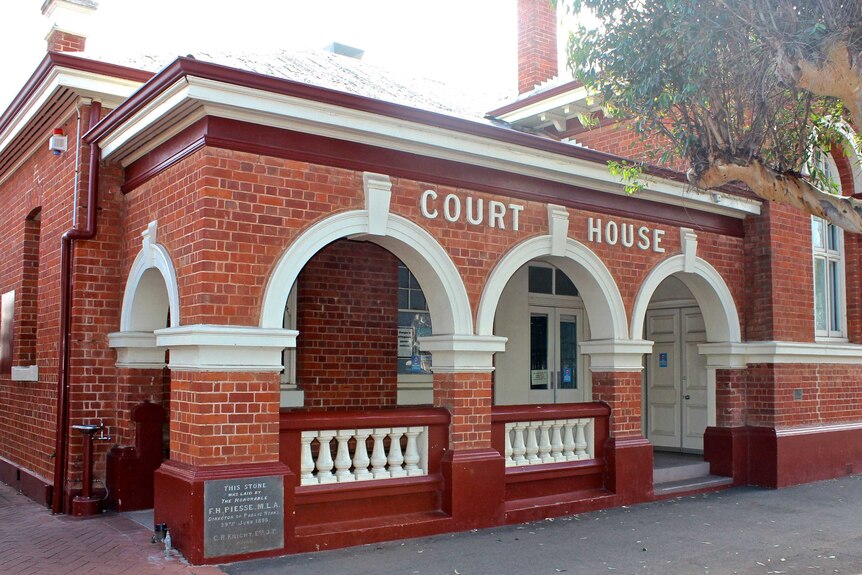 The exterior of a courthouse.