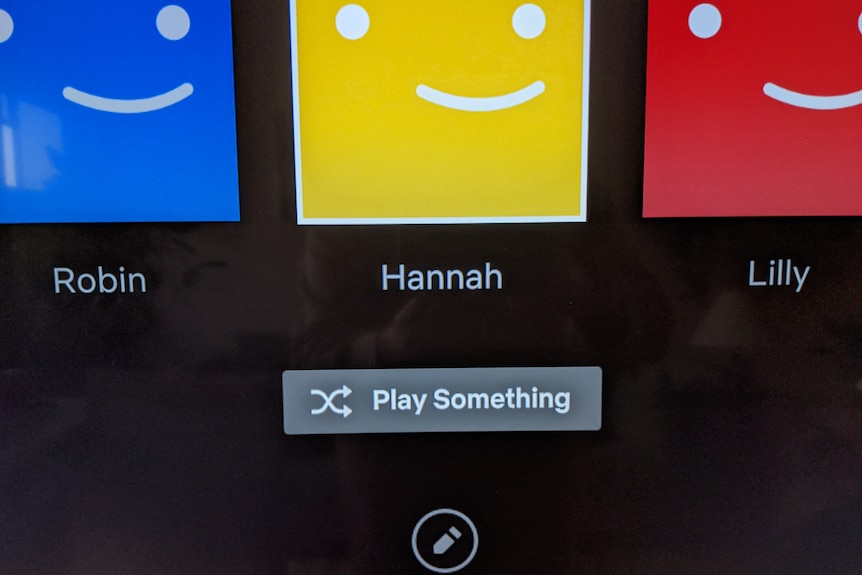 A screenshot of Netflix landing page with the button "play something" and profiles for Robin, Hannah and Lilly