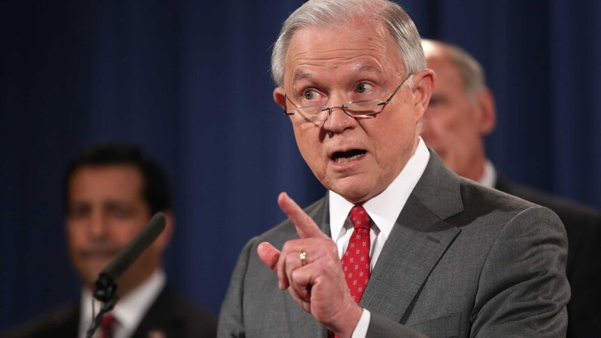 Attorney General Jeff Sessions speaks during a news conference on leaks, he points his finger as he speaks.