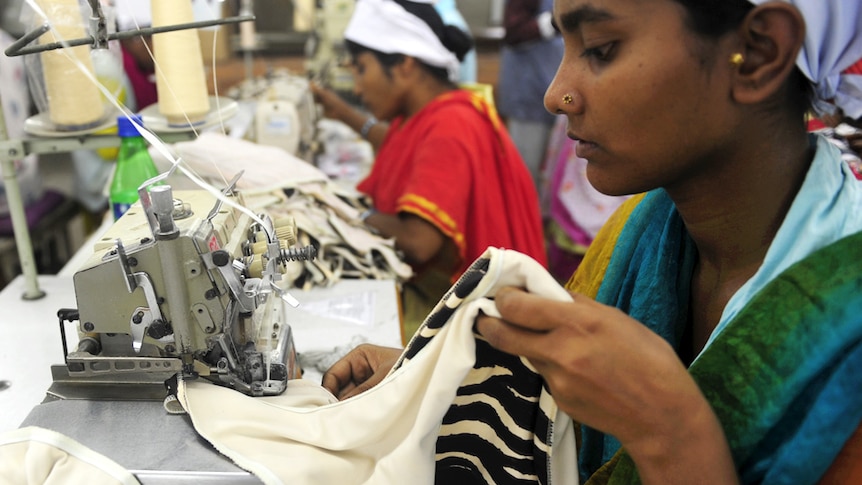 Bangladeshi women work in a garments factory in Dhaka in, 2012.