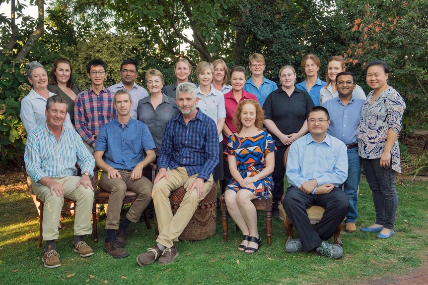 Image of all staff at corowa rutherglen medical centre posing for photo.