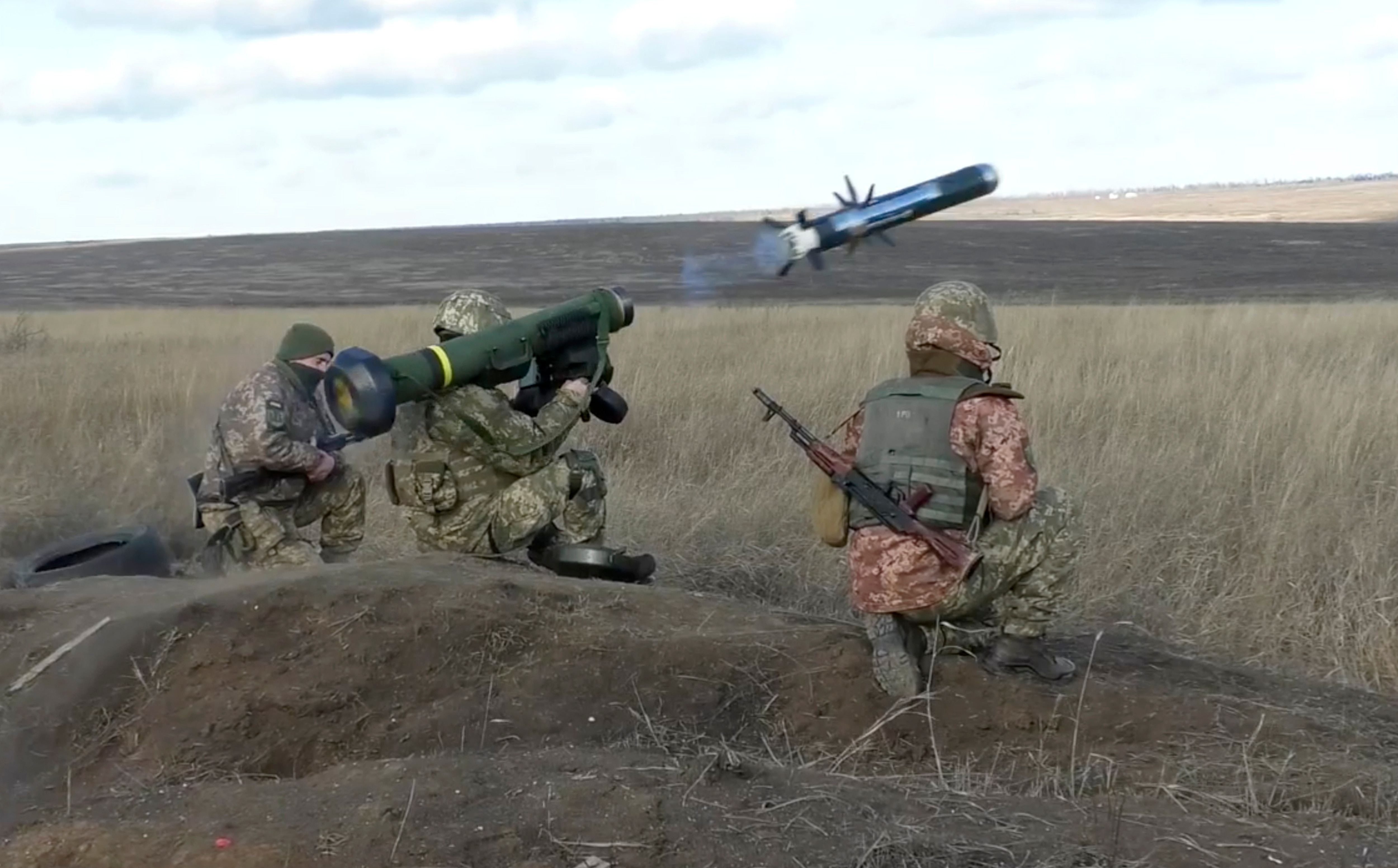 Ukrainian soldiers use a launcher with US Javelin missiles during military exercises in Donetsk region.