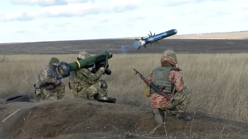 Ukrainian soldiers use a launcher with US Javelin missiles during military exercises in Donetsk region.