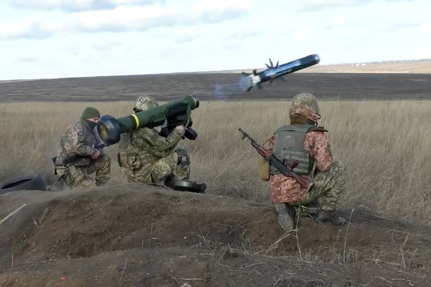 Ukrainian soldiers use a launcher with US Javelin missiles during military exercises in Donetsk region.