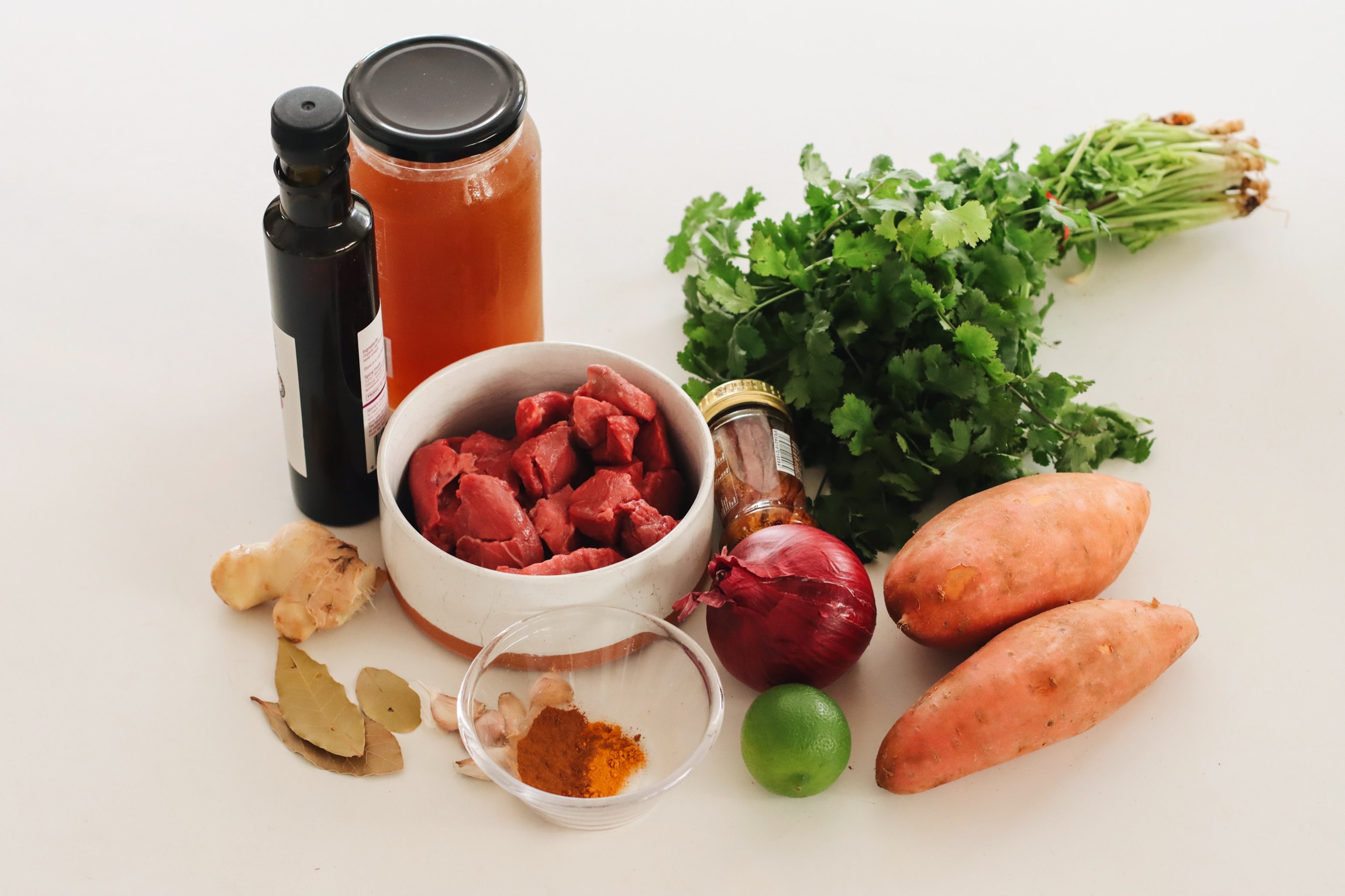 Chuck steak, ginger, bay leaf, sweet potato, red onion, beef stock and anchovies combine to make a delicious stew.