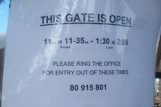 The sign advising the Wilcannia school gates are locked during lesson times.