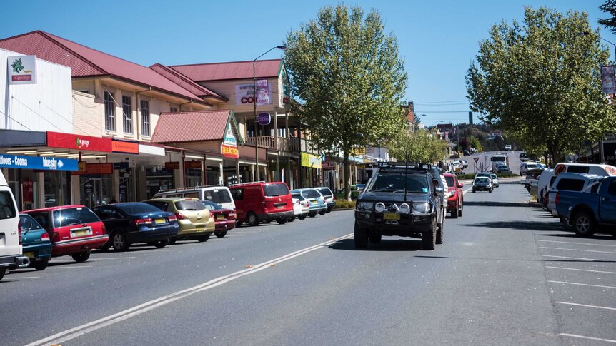 Cars drive down the main street of Cooma in New South Wales.