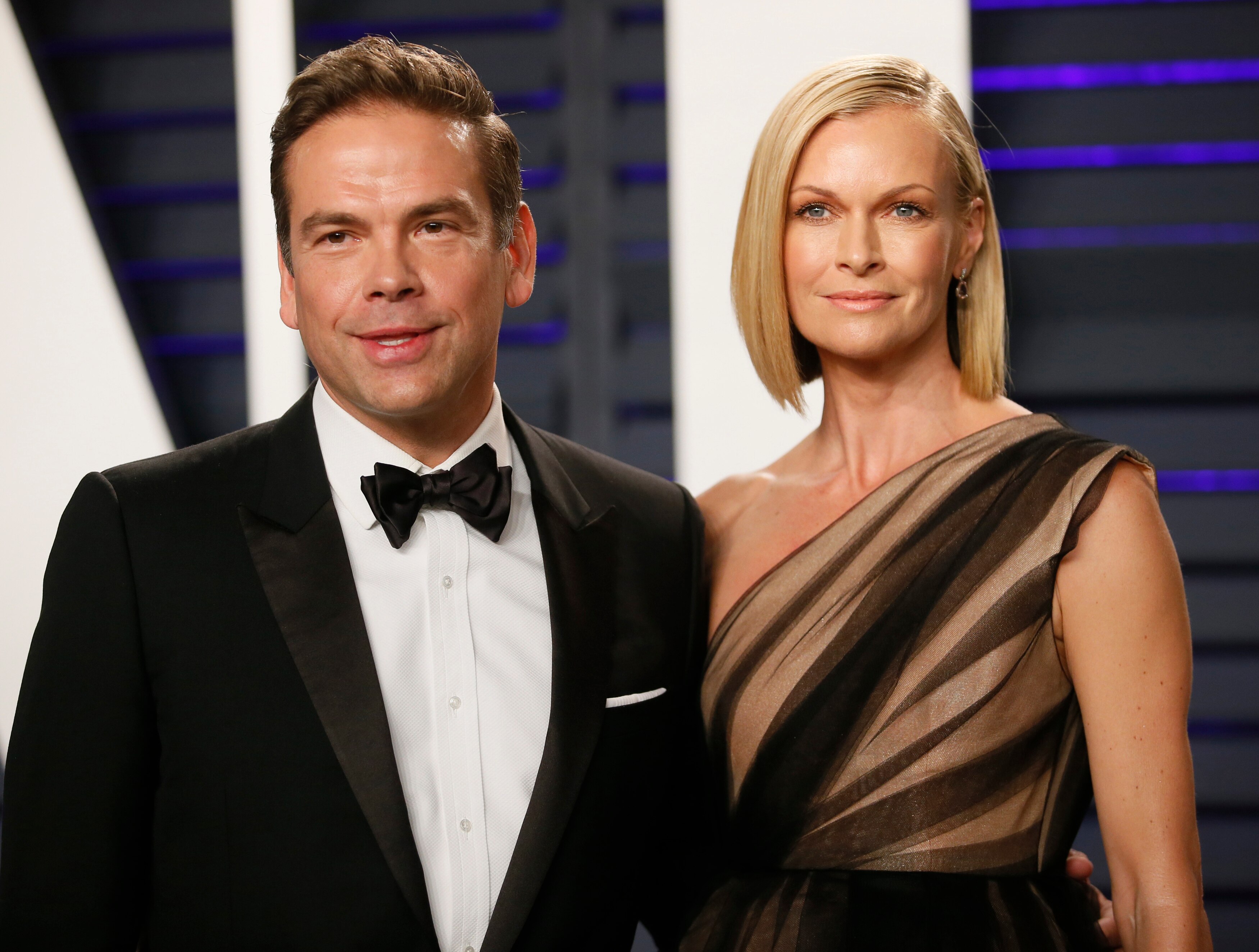 Lachlan and Sarah Murdoch at a red carpet event.