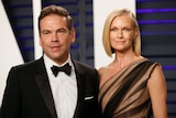 Lachlan and Sarah Murdoch at a red carpet event.