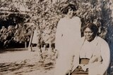 Maria Koosney (standing) and Angelina McKenzie in the gardens of "Whitehill" Station, Longreach in 1920.