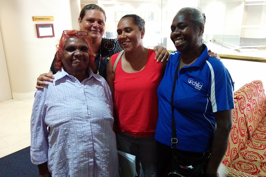 Leaders at the Bagot community are all smiles after the creditors' meeting.