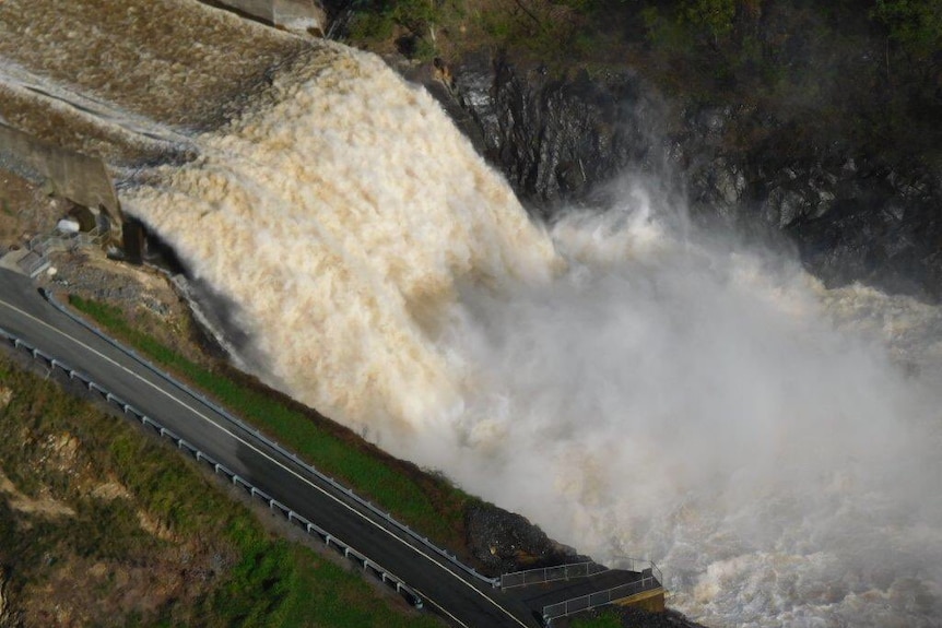 Hinze Dam in the Gold Coast hinterland overflowing