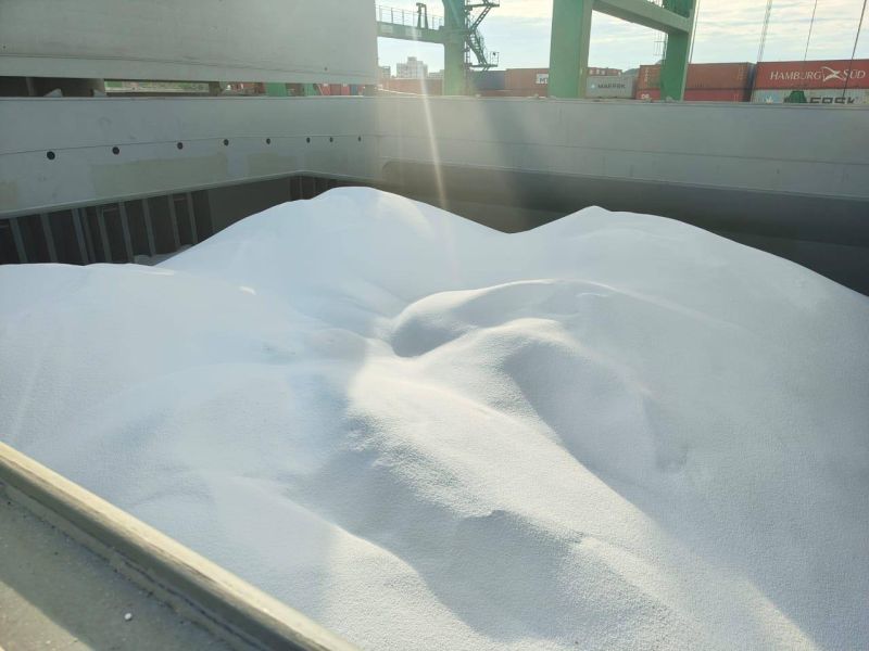 A big pile of white urea on a ship