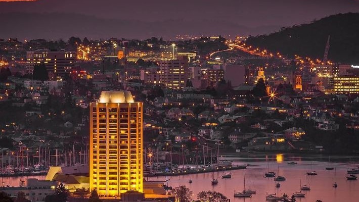 Wrest Point tower stands out in the Hobart amber sunset.