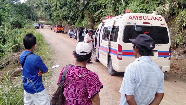 An ambulance on the side of the road in a small village in Borneo.