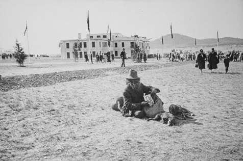 Jimmy Clements sitting on the ground.