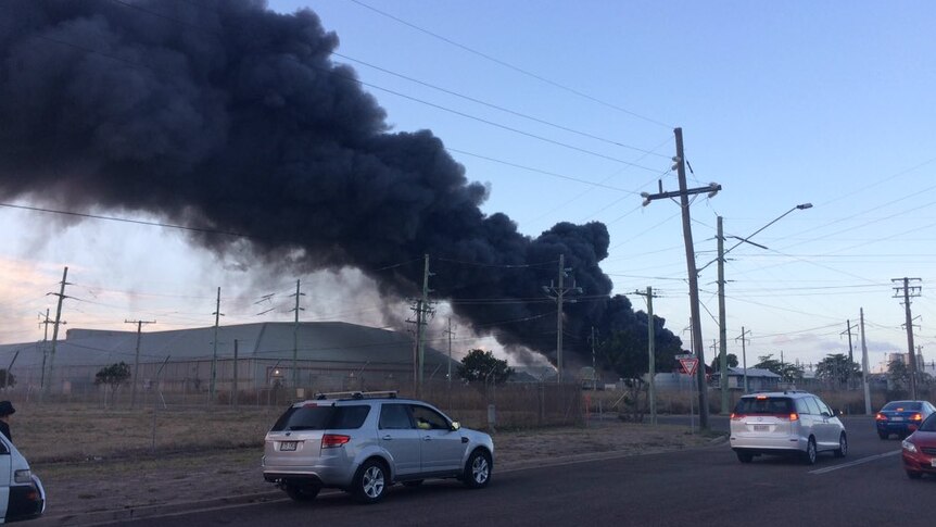 Thick black smoke plumes from an area close to Townsville Port