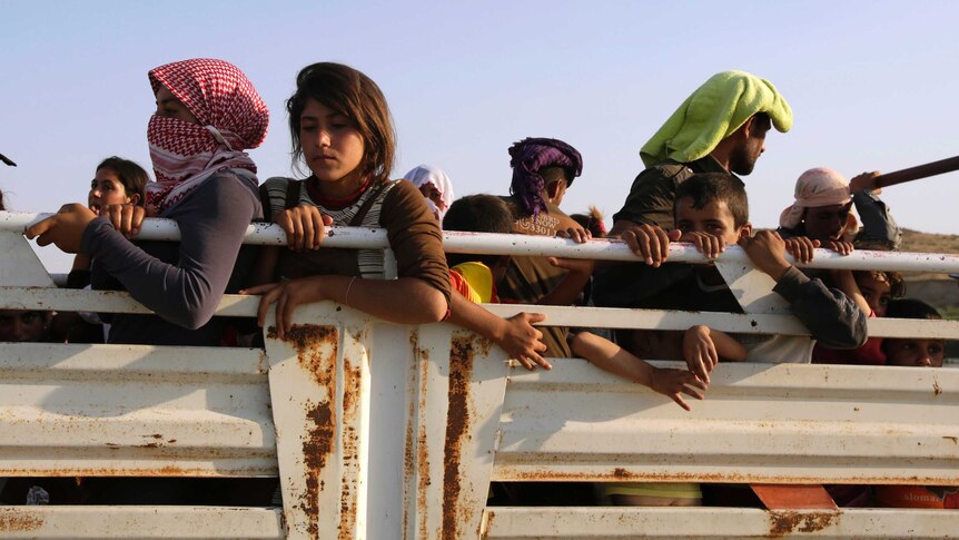 Yazidis flee Sinjar