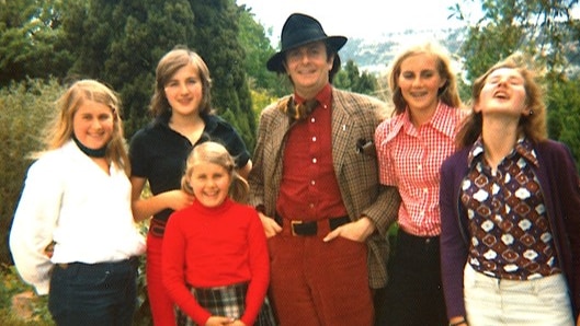 The Green family with Australian comedian, Barry Humphries, in their garden in Launceston. 