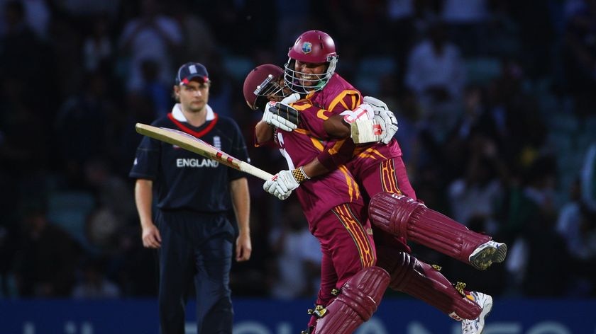 Ramnaresh Sarwan and Shivnarine Chanderpaul celebrate victory.